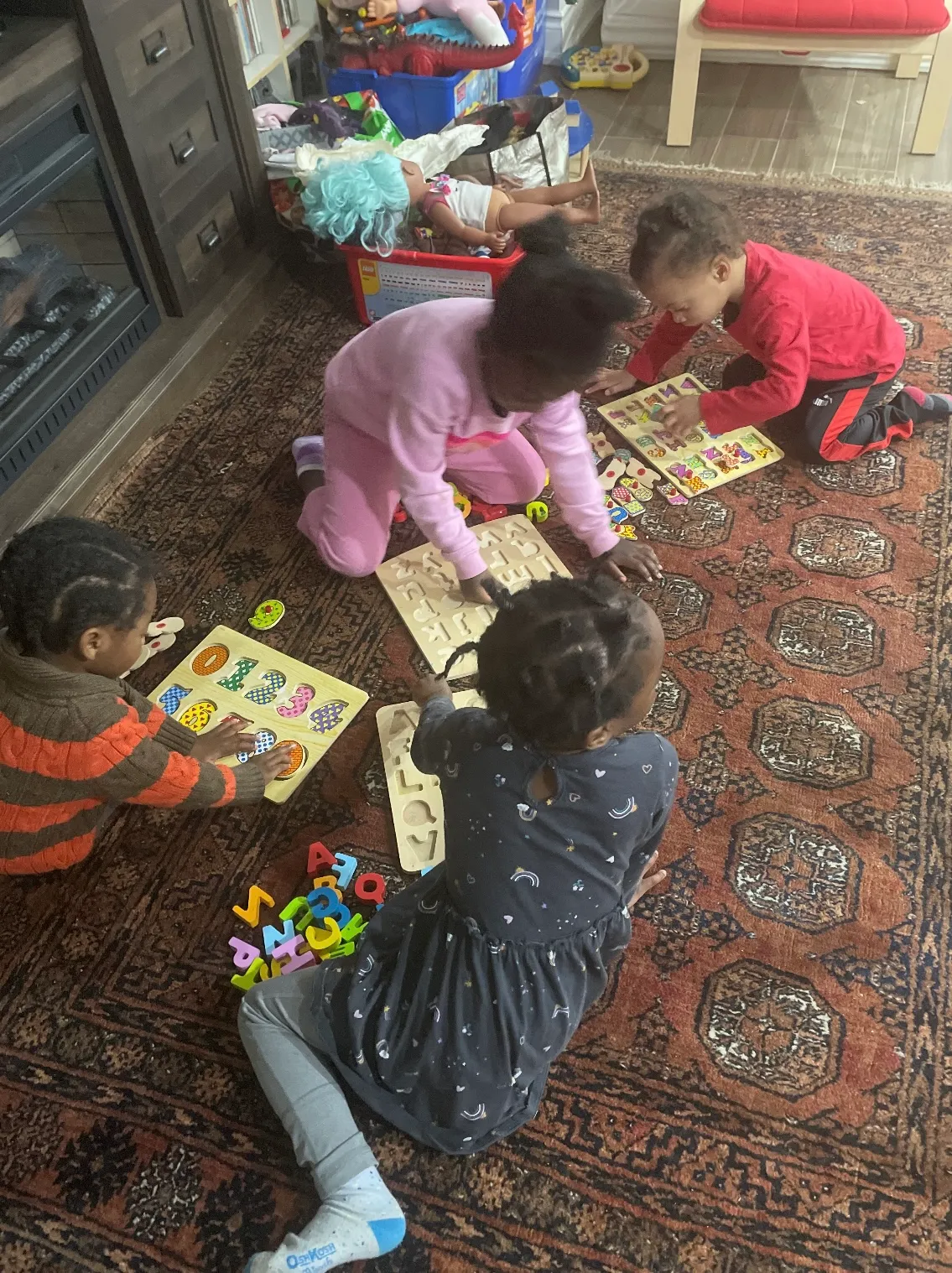 Photo of daycare kids solving number puzzles